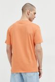 Бавовняна футболка Tommy Jeans колір помаранчевий з аплікацією