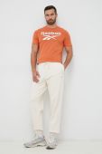 Бавовняна футболка Reebok колір помаранчевий з принтом