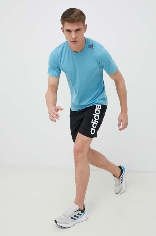 Тренувальна футболка adidas Performance Designed for Training однотонна колір блакитний фото 2