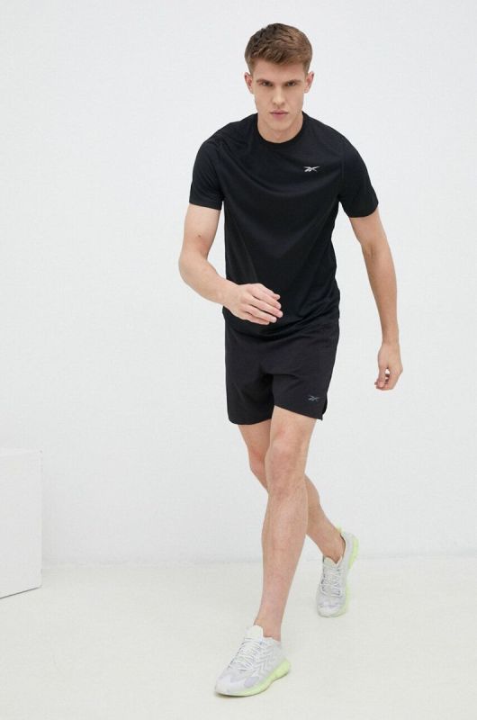 Бігова футболка Reebok колір чорний з принтом фото 2