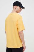 Бавовняна футболка Champion колір жовтий візерунок