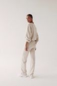 Спортивні штани MUUV. колір бежевий однотонні (3490853)