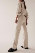 Спортивні штани MUUV. колір бежевий однотонні (3490853)