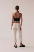 Спортивні штани MUUV. колір бежевий однотонні (3171578)