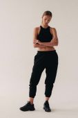 Бавовняні спортивні штани MUUV. колір чорний однотонні